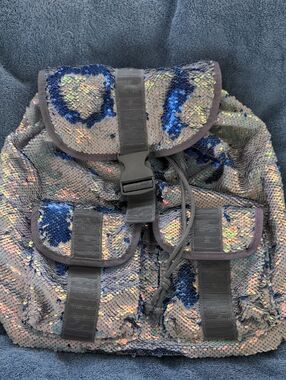Justice Flip Sequin Rusack